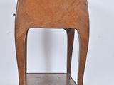 a small wooden table with a drawer on it