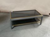 table basse avec plateau en verre et pieds en métal