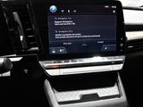 a car dashboard with a cell phone in it