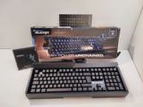 a box with a keyboard and a mouse on a table
