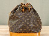 louis vuittoupe bucket bag in brown and tan