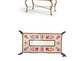 three pieces of furniture including a bench, rug, and rug