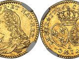 a gold sovereign coin with a crown on top of it