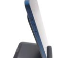 a close up of a cell phone on a stand