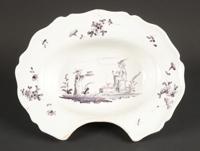 une image représentant une assiette sur laquelle figure un bateau