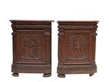 pair of antique carved wood side tables with figures on them