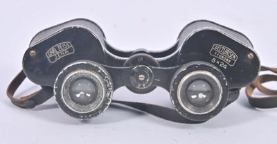 a pair of binoculars that are sitting on a table