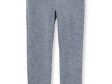 un pantalon gris pour petite fille avec des volants sur les côtés