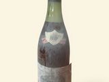 a bottle of wine that is sitting on a table
