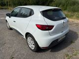 a white car parked on the side of the road