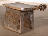 a small wooden bench with a skateboard on top of it