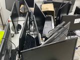 a lot of computers that are sitting on a table