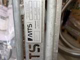 a close up of a metal gate with a sticker on it