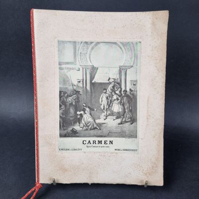 an old book with a picture of a man and woman in a room