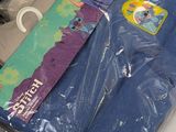 a plastic bag that has a pair of blue pants on it