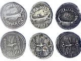 six ancient roman coins, one of which has been cleaned and the other of which has been cleaned