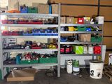 a garage with a lot of tools on the shelves