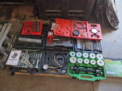 a lot of tools that are sitting on the floor