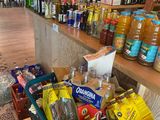many bottles and cans of alcohol on the counter