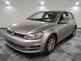 the volkswagen golf is parked in a clean room with a checkered floor