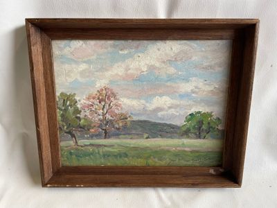 une peinture à l'huile d'un champ avec des arbres au loin