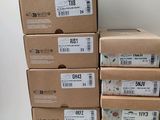 several boxes are stacked on top of each other on a table
