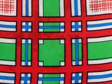 a close up of a red, green, and blue plaid tie