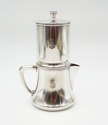 silver plated coffee pot and saucer