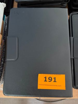 a black laptop computer sitting in a box next to other laptops
