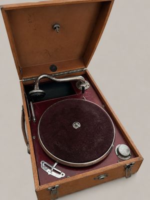 a wooden case with a record player inside of it