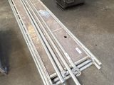 a long metal bench in the middle of a building