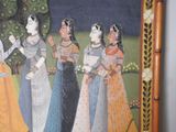 a painting of a group of women standing in front of a tree