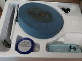 a blue cake sitting on top of a white box