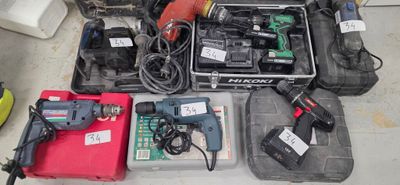 a lot of tools that are laying out on the floor