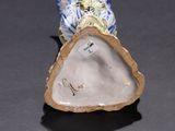 a figurine of a bird on a table