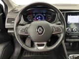 a picture of the interior of a car with a steering wheel