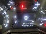 a car dashboard with a digital display on it