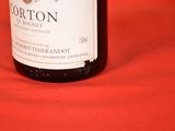 a bottle of wine that is sitting on a table