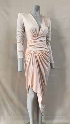 an image of a mannequin dressed in a pink dress