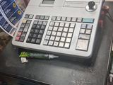 a calculator sitting on top of a table in a store