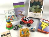 many toys and books on the table together