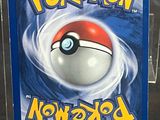 a box with a picture of a pokemon ball inside of it