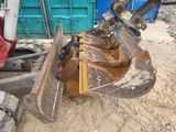 a large excavator that is sitting in the dirt