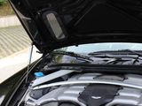 a close up of the hood of a car with the hood open