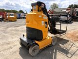 an image of a forklift parked in a parking lot