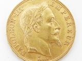 an image of a gold coin with a man ' s face on it