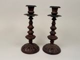 pair of antique cast iron candlesticks