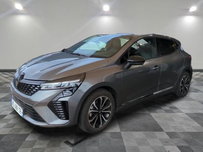 a grey 2020 toyota c - hr is parked in a room with a checkered floor