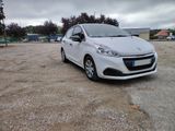 a white car that is parked in a parking lot