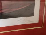 a picture of a picture of a person on a surfboard